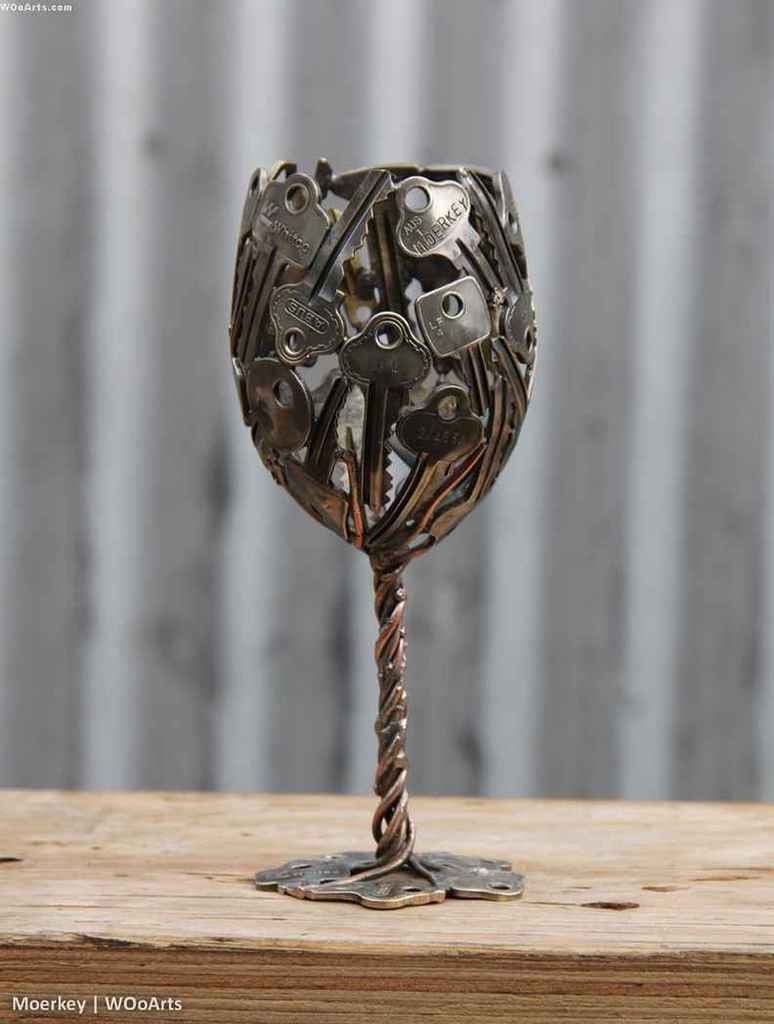 michael-moerkey-recycled-metal-sculptures-key-coin-02